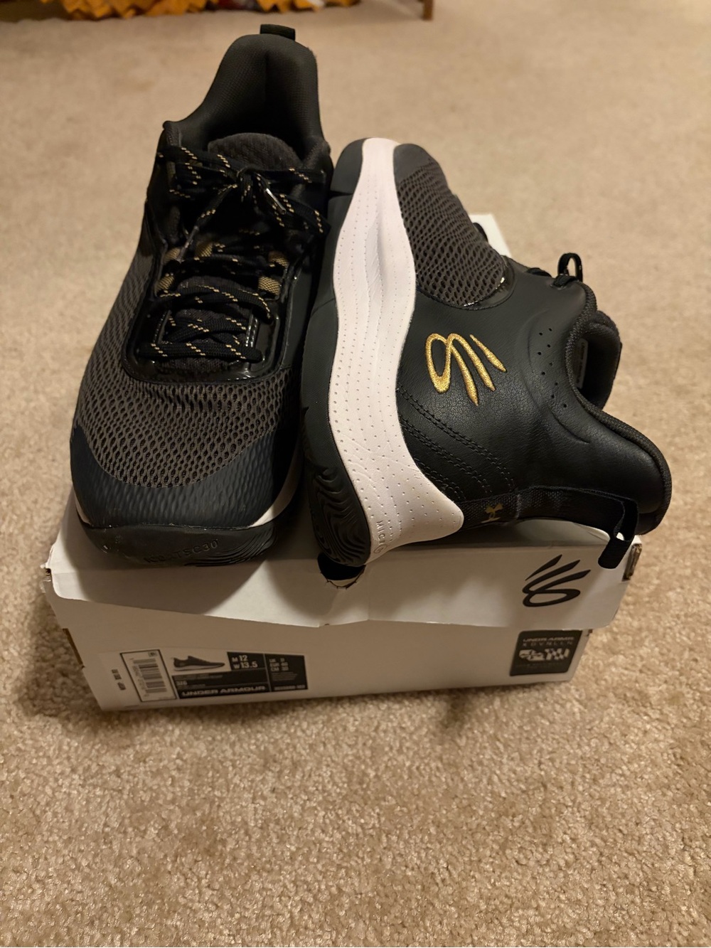 Under Armour Black and White Men's Athletic Shoes with Gold Accent